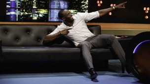 Usain Bolt does his trademark celebration pose