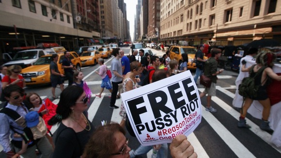 Protesters march through midtown Manhattan while demonstrating in solidarity with the Russian punk band Pussy Riot in New York