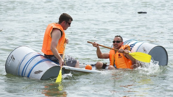 Competitors take part in the annual Arundel Bathtub Race, Arundel, West Sussex.
