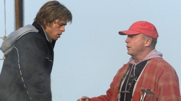 Brad Pitt seen talking to Tony Scott during the film of 'Spy Game' in Budapest