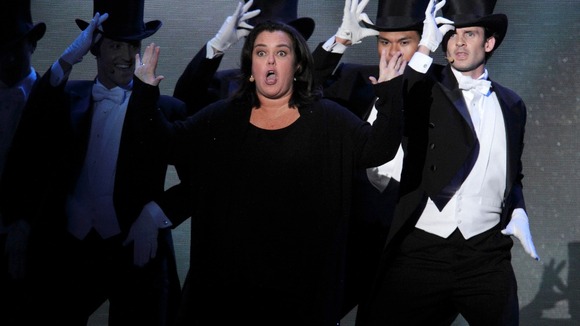 Rosie O'Donnell performs on stage.