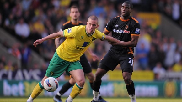 Bassong in action against Steve Morison last season