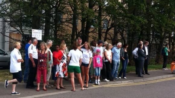 Crowds wave goodbye to the teams