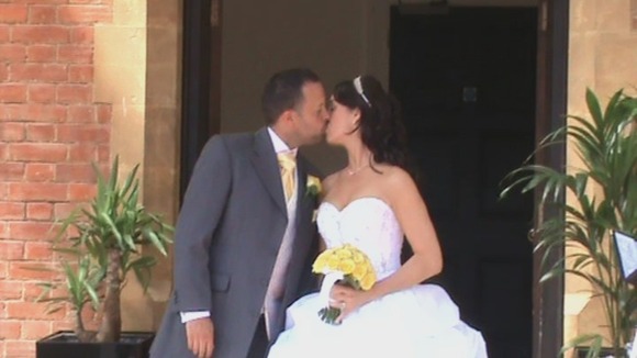 Newlyweds kissing