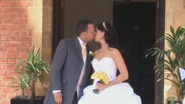 Newlyweds kissing