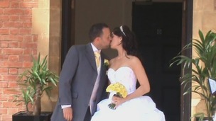Newlyweds kissing