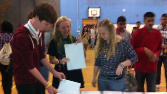 Students open their GCSE results