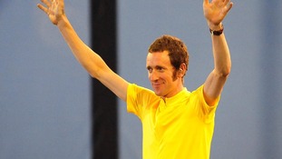 Wiggins waves to the crowds during the Olympic Opening Ceremony