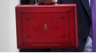 Chancellor of the Exchequer George Osborne holds up his ministerial red box in 2011