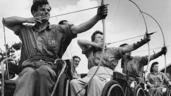 An archery class at the Ministry of Pensions Spinal Centre at Stoke Mandeville Hospital, Buckinghamshire in 1949