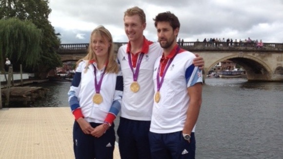 Anna Watkins, Alex Gregory and Pete Reed pose with their gold medals in Henley-on-Thames
