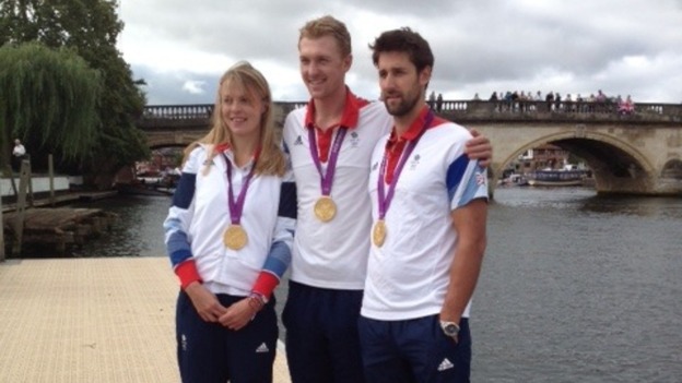 Anna Watkins, Alex Gregory and Pete Reed pose with their gold medals in Henley-on-Thames
