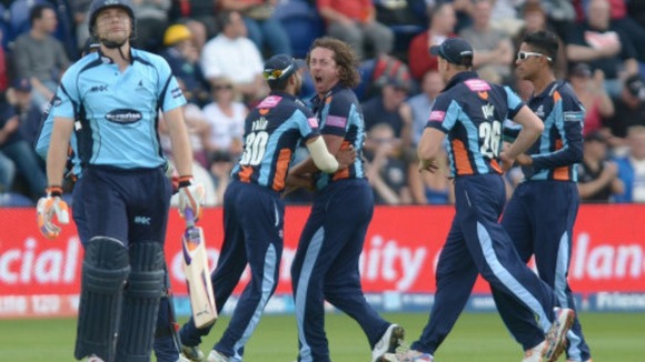 Yorkshire's Ryan Sidebottom celebrates with team-mates after bowling out Sussex's Luke Wright