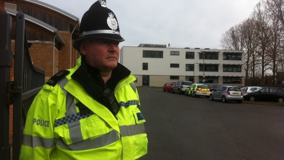 Police guard the entrance to the Haybridge High School and Sixth Form this morning