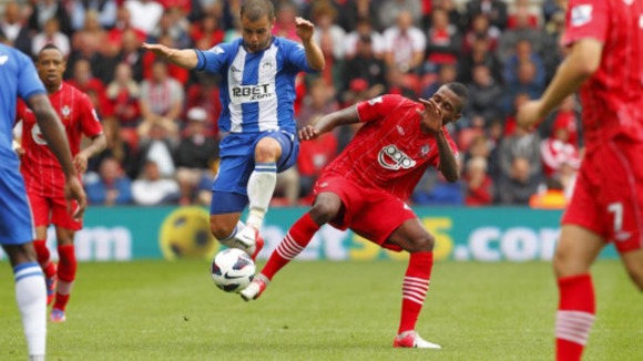 Wigan's Shaun Maloney (left) in action against Southampton's Guly Do Prado