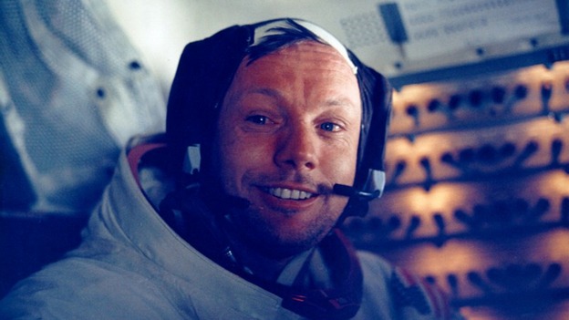 Neil Armstrong smiles in the lunar module after his historic moonwalk