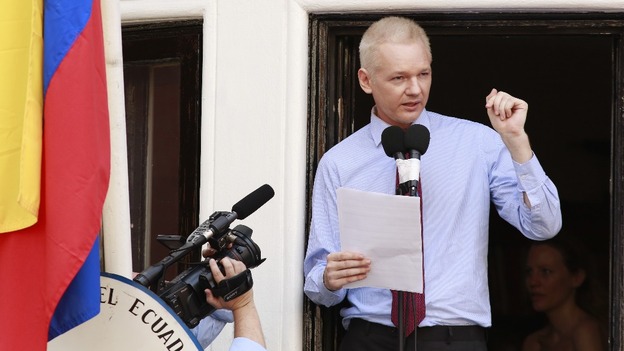 WikiLeaks founder Julian Assange speaks to the media outside the Ecuador embassy in west London