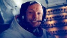 Neil Armstrong smiles in the lunar module after his historic moonwalk