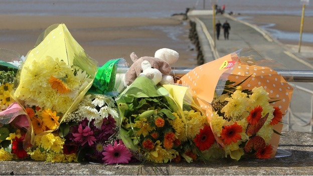 Floral tributes left at the scene in Burnham-on-Sea, Somerset