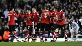 Forest players congratulate Garath McCleary (second from the left) after he scores his side's fourth goal against Leeds.