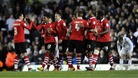 Forest players congratulate Garath McCleary (second from the left) after he scores his side's fourth goal against Leeds. 