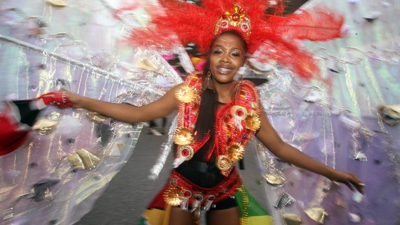 One of the dancers takes part in the Notting Hill Carnival in west London.