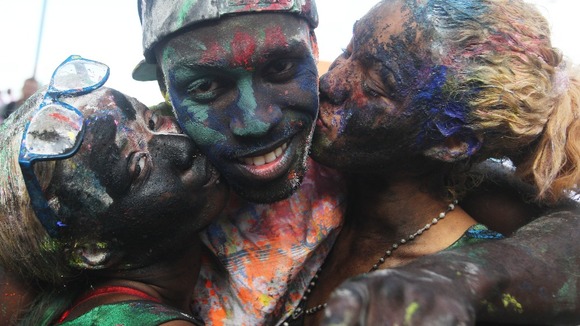 Dancers take part in the Notting Hill Carnival in west London.