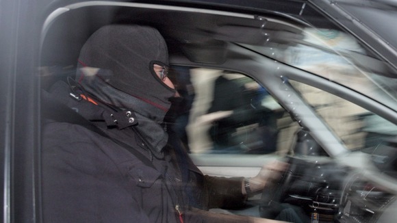 French special intervention police arriving at a raid on a house to arrest suspected gunman