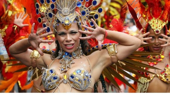 The Paraiso School of Samba take part in the Notting Hill Carnival, London.