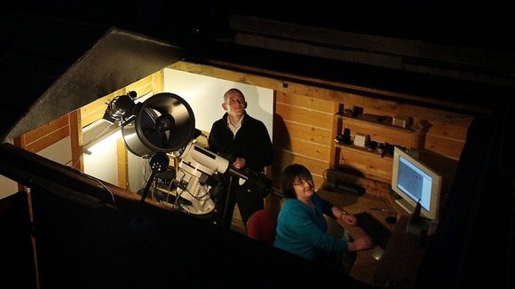 Dave Grennan and his wife Carol in their back garden observatory