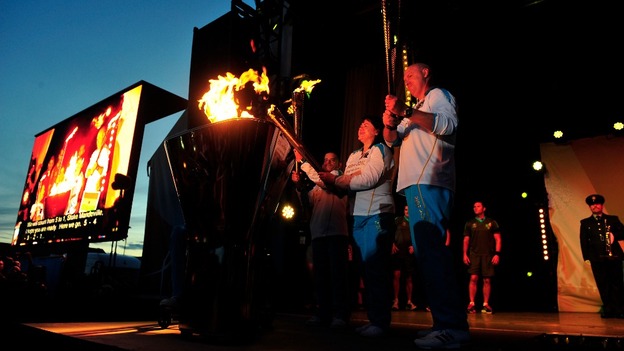 The flames unite to light the Paralympic Cauldron