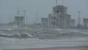 The Harbormaster's building in Gulfport Mississipi flying hurricane flags