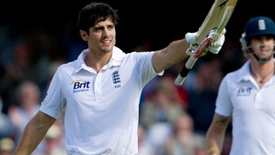England's Alastair Cook reaches his 100 during the first day of the first cricket test match against South Africa