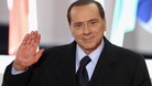 Silvio Berlusconi leaves the conference centre after the first day of the G20 Summit in Cannes in 2011
