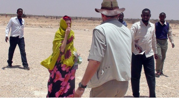 Judith Tebbutt is led to a plane