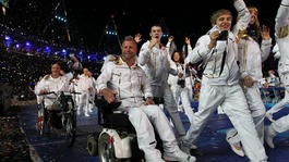 Lee Pearson (centre) and members of Great Britain's Paralympic Team make their way out during last night's Opening Ceremony 