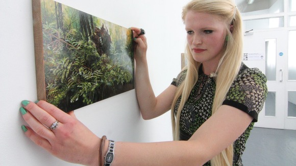 Georgia Dodson with one of her paintings