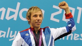 Jonathan Fox celebrates after winning gold in the Men's 100m Backstroke.