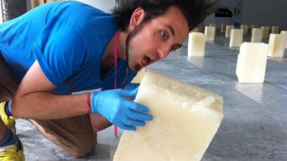 Artist moves a brick