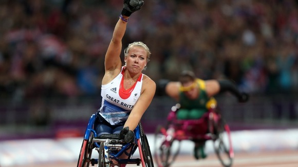 Great Britain's Hannah Cockroft celebrates winning Gold in the Women's 100m T34