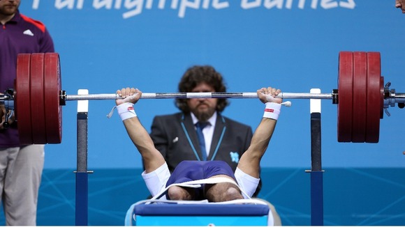 Great Britain's Ali Jawad, competes during the Mens 56kg Group A powerlifting