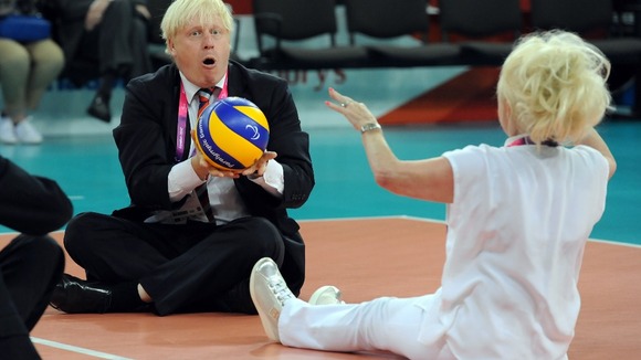 Mayor of London Boris Johnson and actress Barbara Windsor have a game of sitting volleyball after the women's event at the Excel Arena