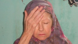 Judith Tebbutt with head in hands