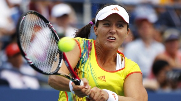Laura Robson hits a return to Stosur during their singles match at the U.S. Open