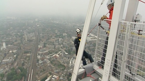 Prince Andrew begins the abseil, which takes about an hour.