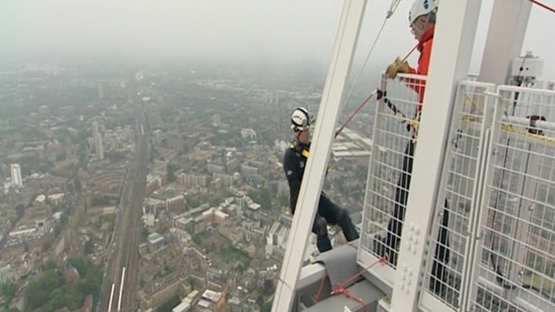 Prince Andrew begins the abseil, which takes about an hour.