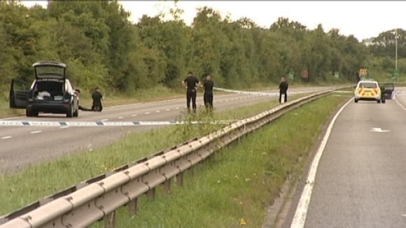 Police on the A444 yesterday