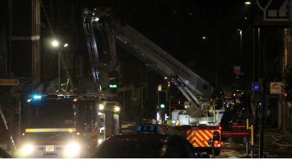 An aerial ladder platform is used to bring the fire under control