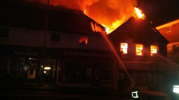 The blaze enters the roof space of the British Heart Foundation
