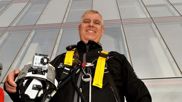 The 52-year-old completes the abseil.